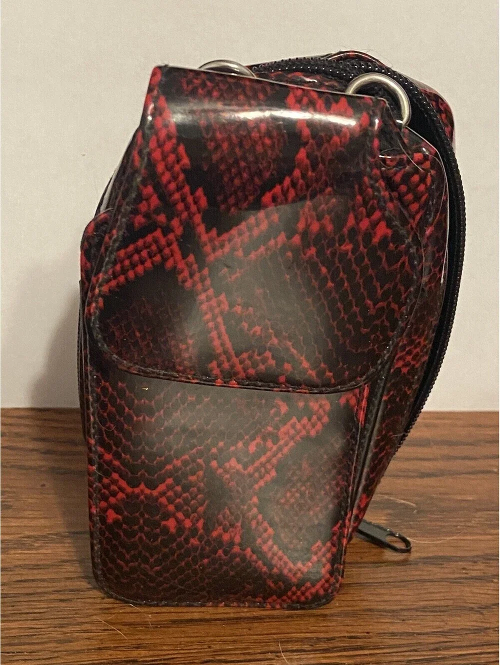 phone case red and black snakeskin look, vinyl. Fits I Phone.